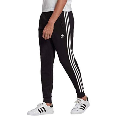 Pantalón adidas negro rayas blancas.(hombre)